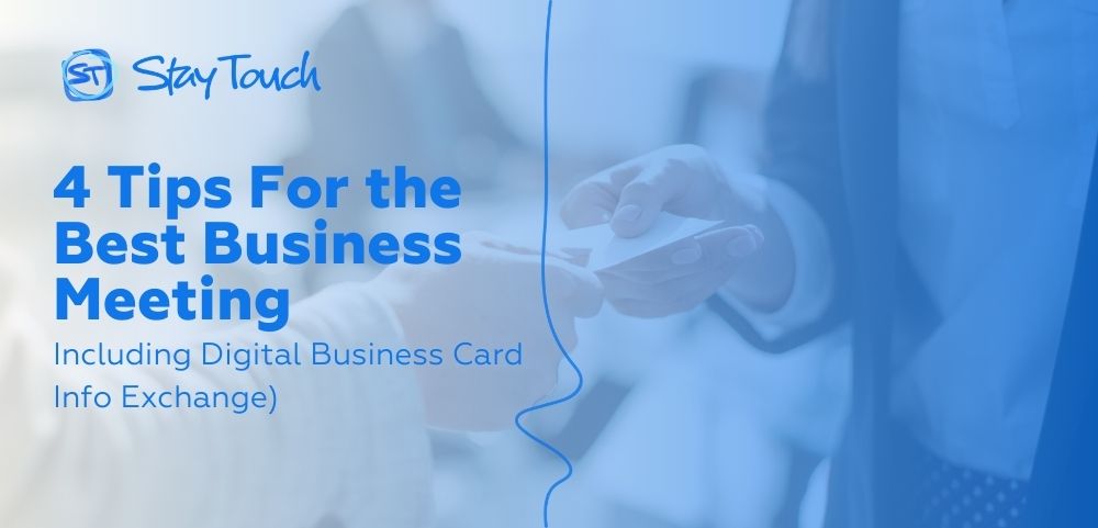 businessman handing over business card to prospective client